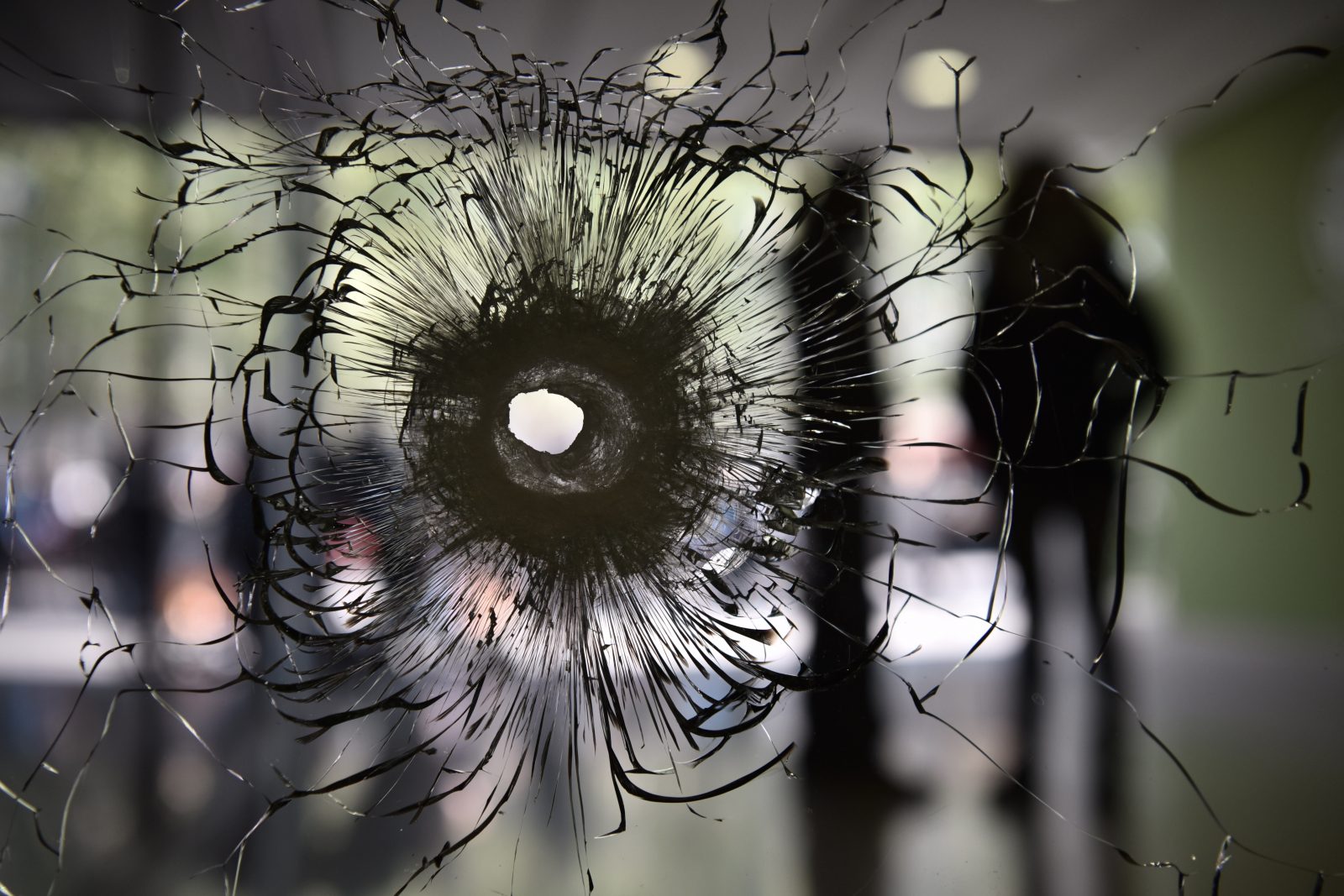 bullet hole in glass